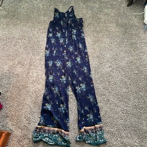 Blue floral print jumpsuit.